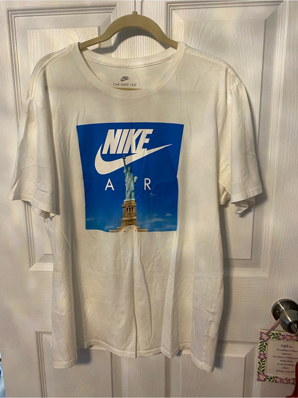 Nike White Graphic Tee with Statue of Liberty Print